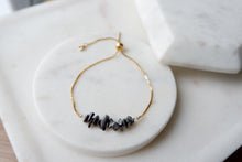 Load image into Gallery viewer, Hematite "GAIA" tumbled stone necklace and bracelets.
